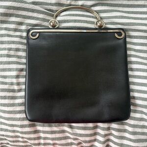Leather purse with silver handles